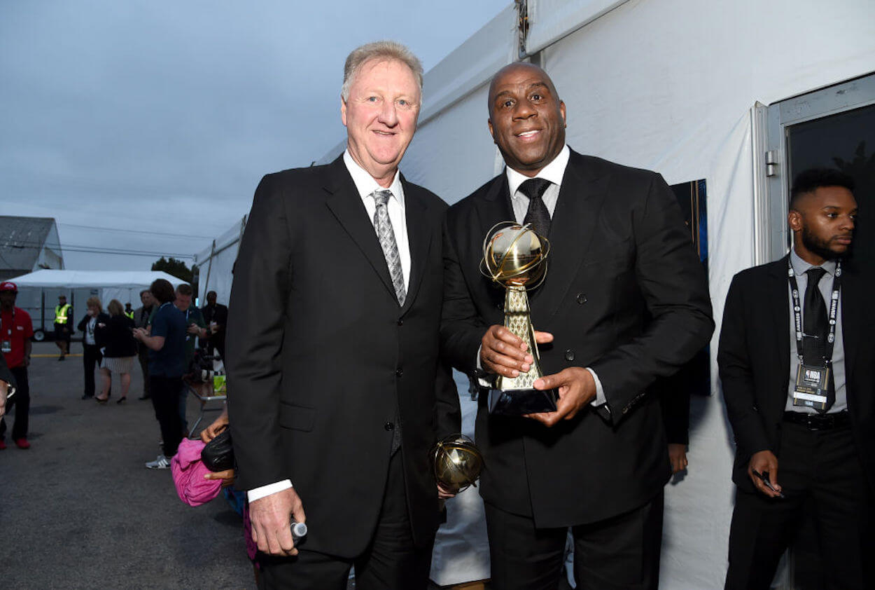 Larry Bird and Magic Johnson pose with their NBA Lifetime Achievement Award in 2019.