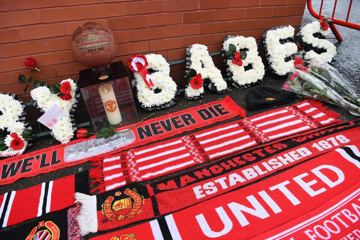 Flowers and momentos are left outside Old Trafford stadium during a ceremony to commemorate the victims of a plane crash 60 years ago, in Munich, Germany when eight players and three team members of English football club Manchester United were killed, on February 6, 2018 in Manchester, north west England.