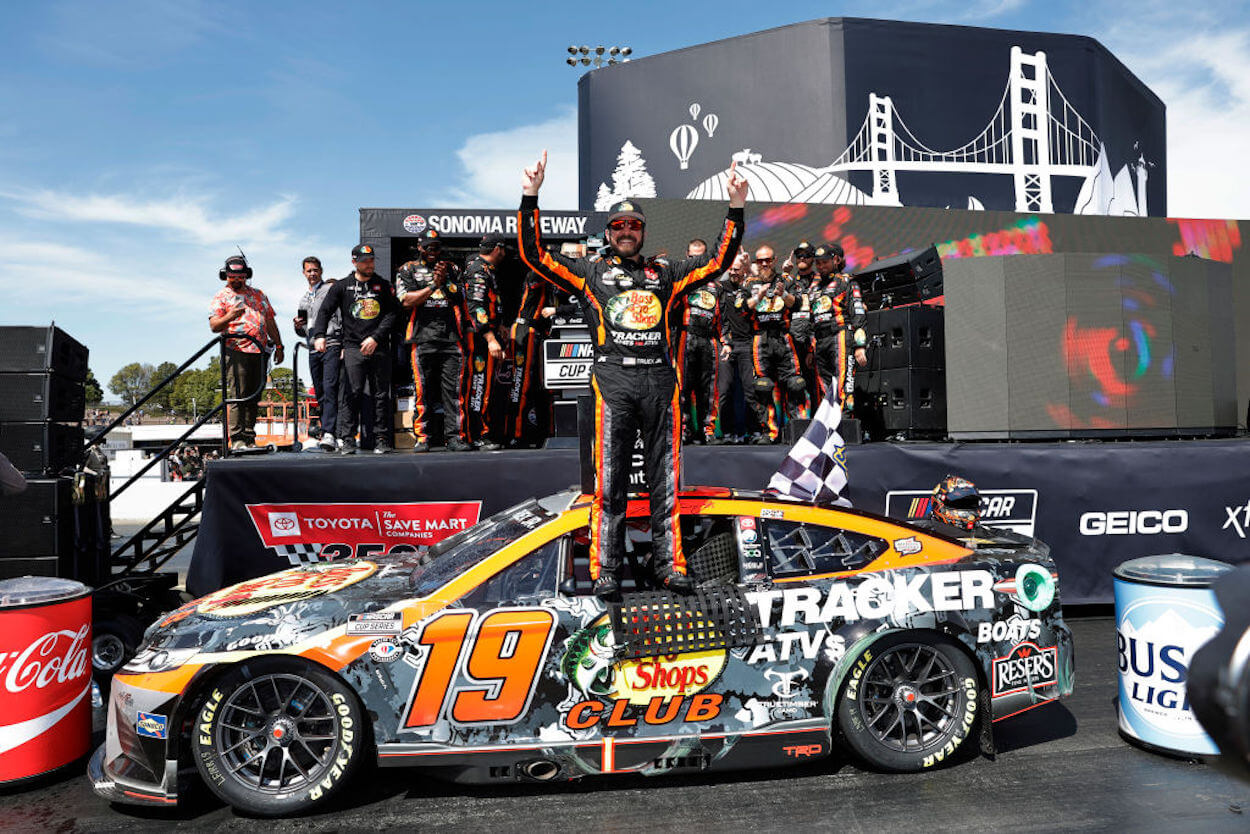 Martin Truex Jr. celebrates with his team after victory at Sonoma.