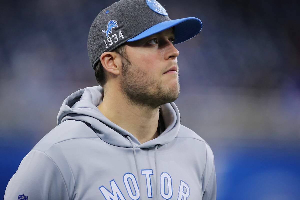 Matthew Stafford of the Detroit Lions watches the action on the sidelines