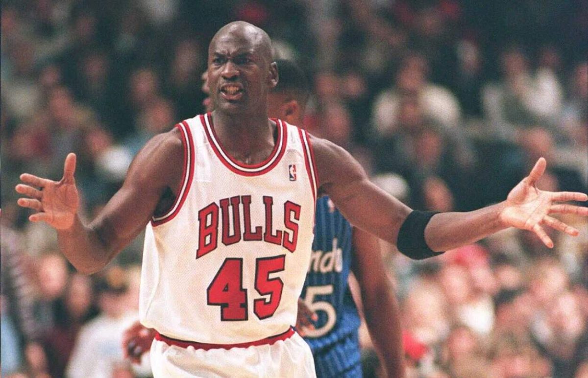 Michael Jordan gestures angrily at the referee during a Bulls game