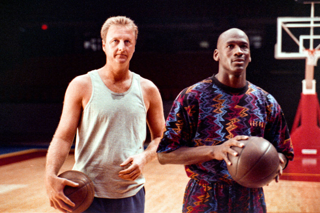 Larry Bird (L) and Michael Jordan (R) film a commercial in 1993.
