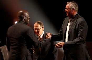 Michael Jordan congratulates Toni Kukoc during his 2021 induction into the Basketball Hall of Fame.