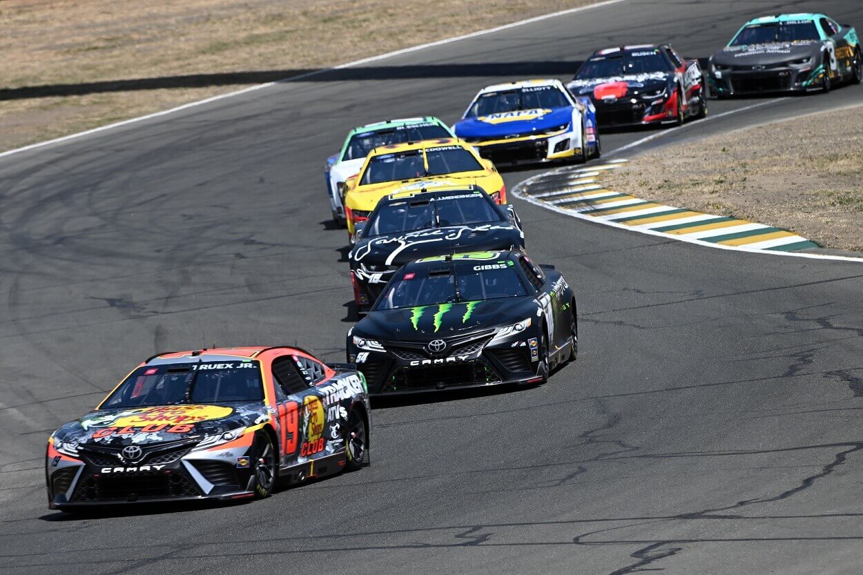 Martin Truex Jr., driver of the #19 Bass Pro Shops Toyota, leads the field during the NASCAR Cup Series Toyota / Save Mart 350 at Sonoma Raceway on June 11, 2023 in Sonoma, California