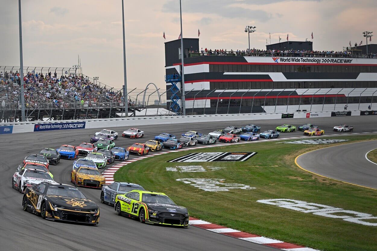 Ryan Blaney, driver of the #12 Menards/Richmond Water Heaters Ford, and Kyle Busch, driver of the #8 3CHI Chevrolet, lead the field during the NASCAR Cup Series Enjoy Illinois 300 at WWT Raceway on June 04, 2023
