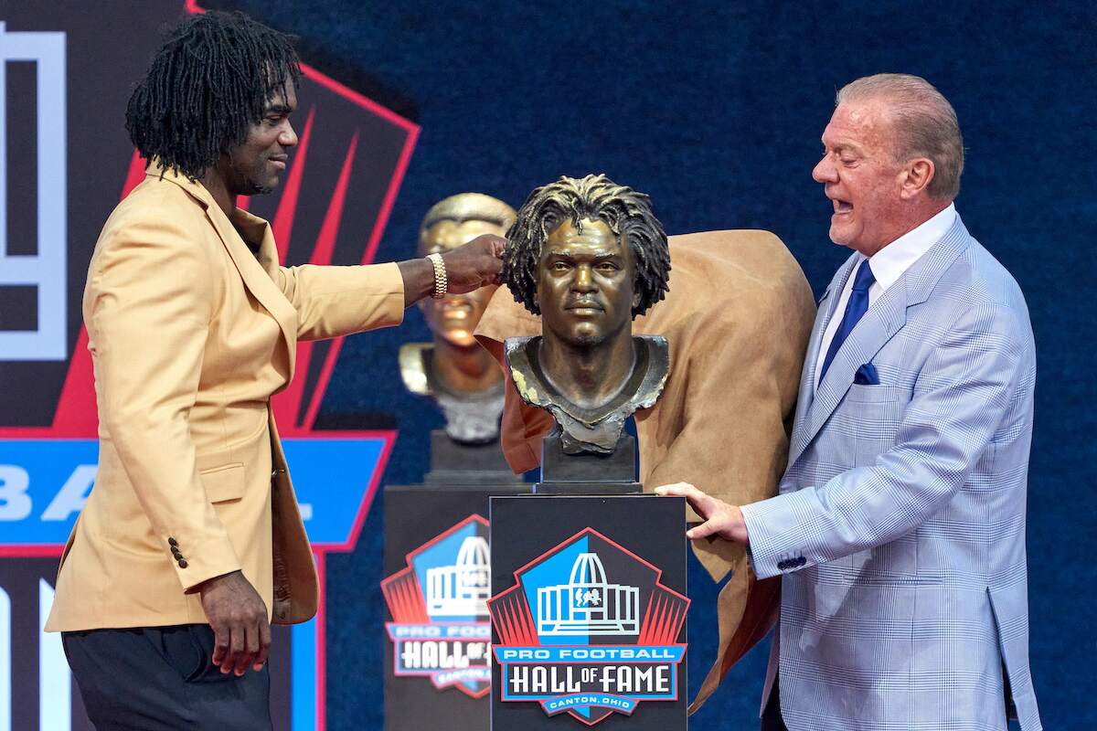 Class of 2020 member Edgerrin James and presenter Jim Irsay unveil his bust during the Pro Football Hall of Fame 2020 enshrinement ceremony