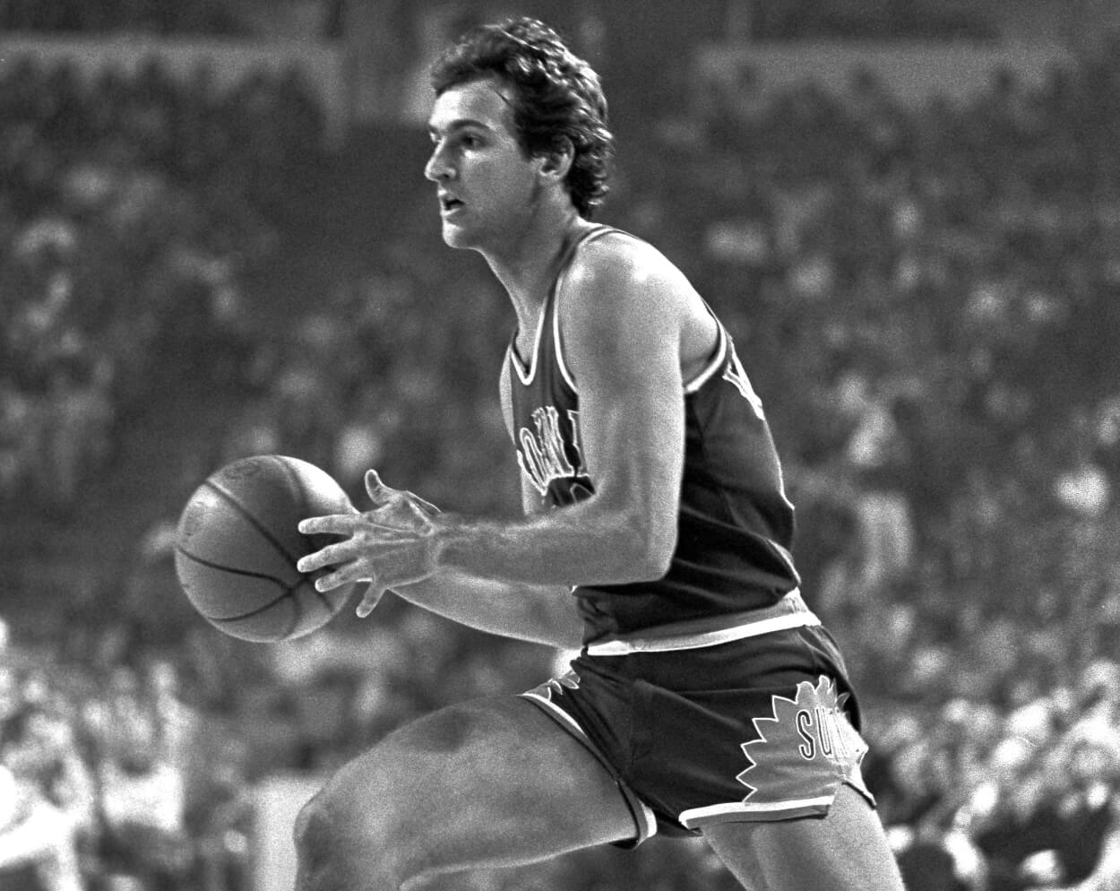 Phoenix Suns guard Paul Westphal dribbles the ball.