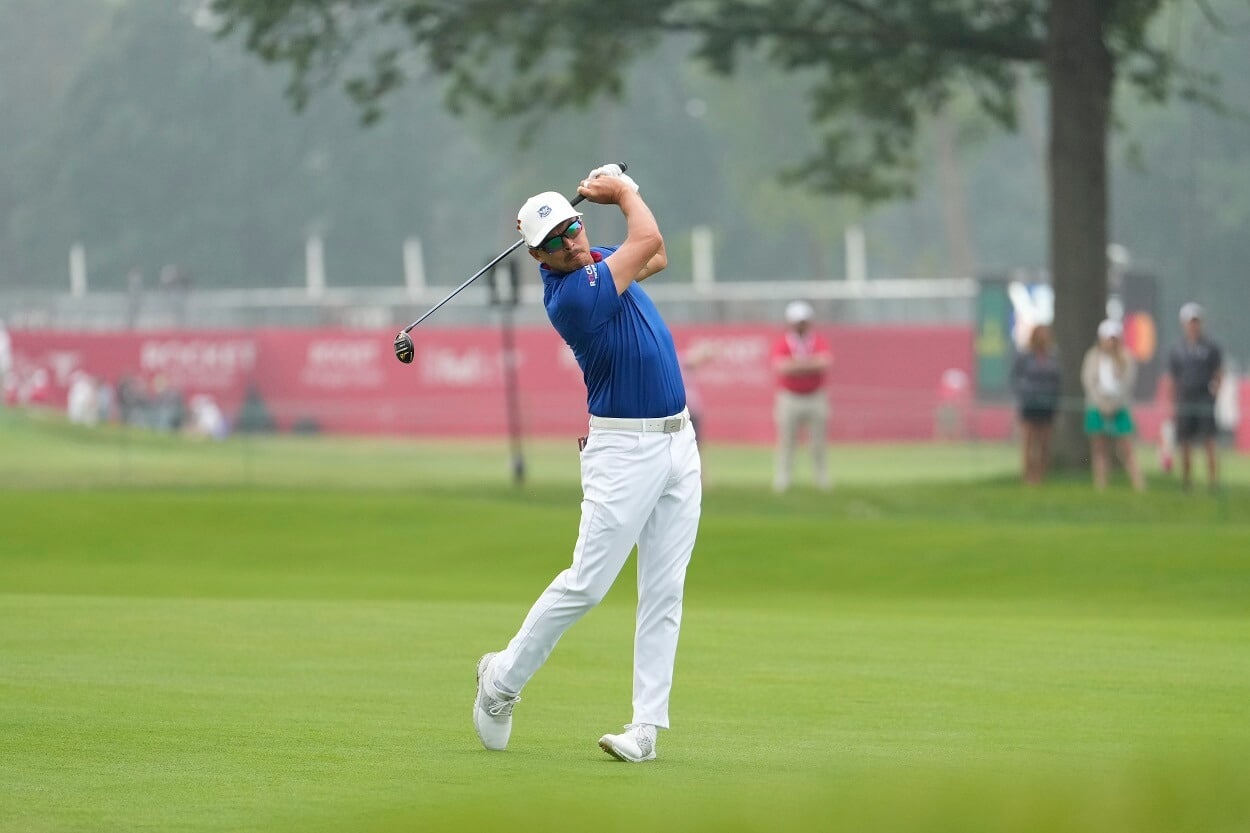 Rickie Fowler of the United States plays his shot on the 14th hole during the first round of the Rocket Mortgage Classic at Detroit Golf Club on June 29, 2023 in Detroit, Michigan