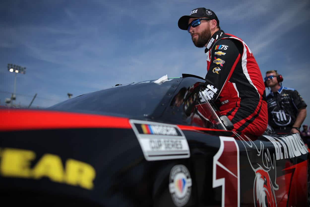 Ross Chastain climbs into his car at the NASCAR Cup Series Enjoy Illinois 300.