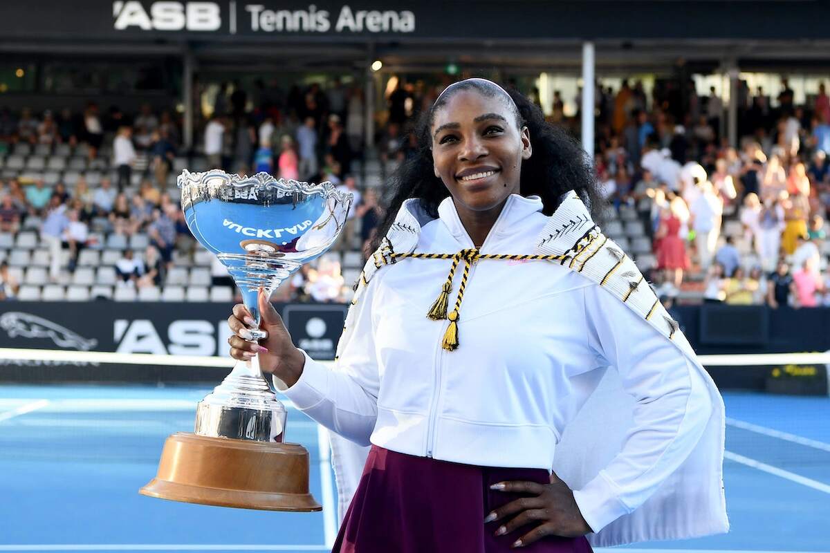 Serena Williams poses with a trophy after winning the 2020 ASB Classic