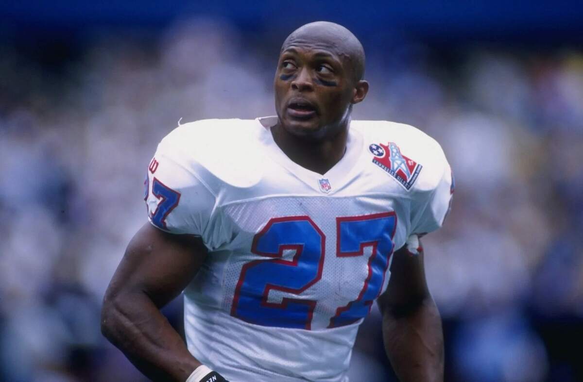 Eddie George of the Tennessee Oilers looks at the scoreboard during a game
