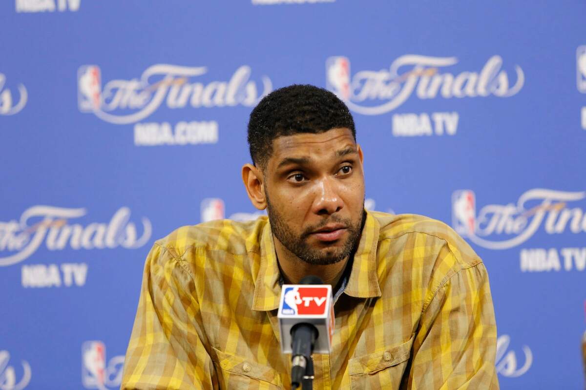 Tim Duncan speaks to the media