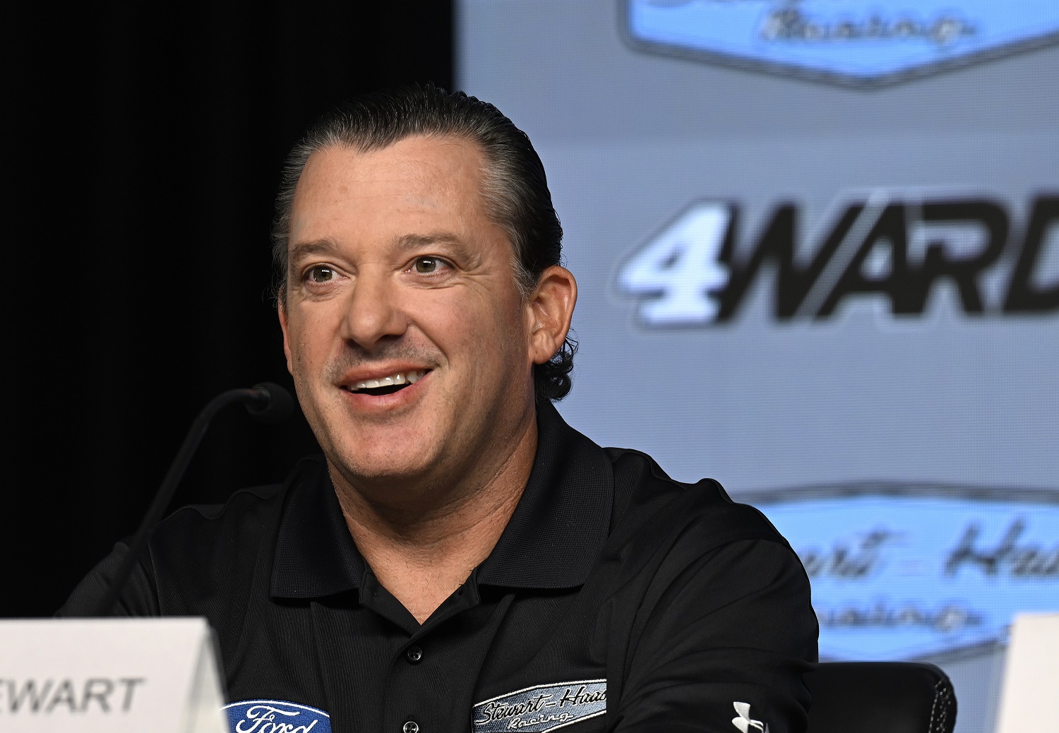 Co-owner Tony Stewart of Stewart-Hass Racing talks with the media during a press conference introducing Josh Berry as the new driver of the No. 4 Stewart-Hass Racing Ford on June 21, 2023.