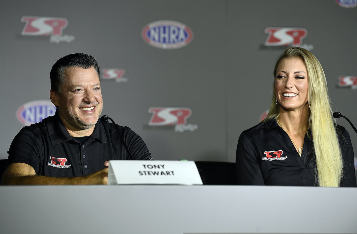 Tony Stewart and Leah Pruett talk to media.