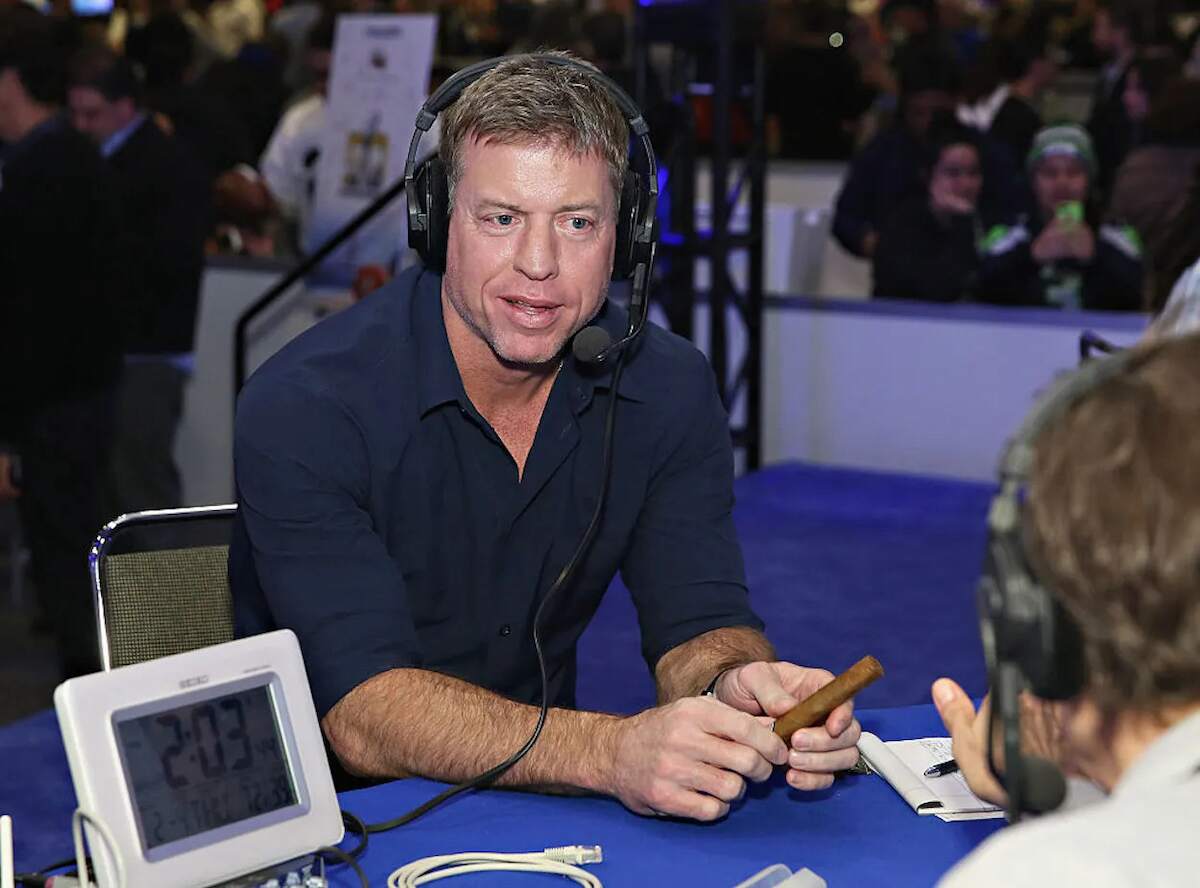 Former NFL player and sportscaster Troy Aikman visits the SiriusXM set at Super Bowl 50 in 2016