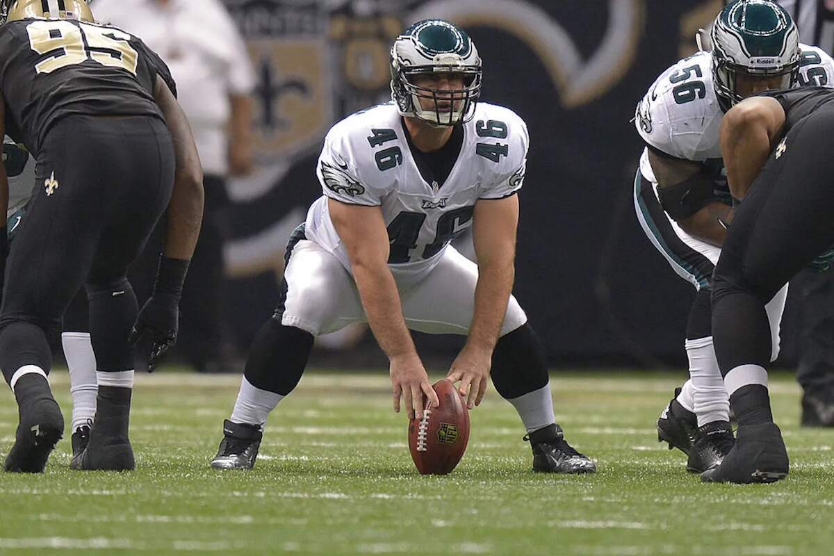Jon Dorenbos of the Philadelphia Eagles gets in position before a play in 2012