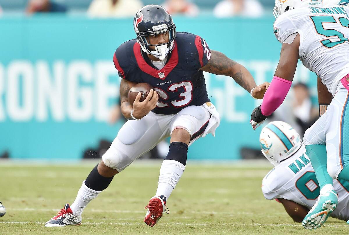 Running back Arian Foster of the Houston Texans carries the ball during a NFL game