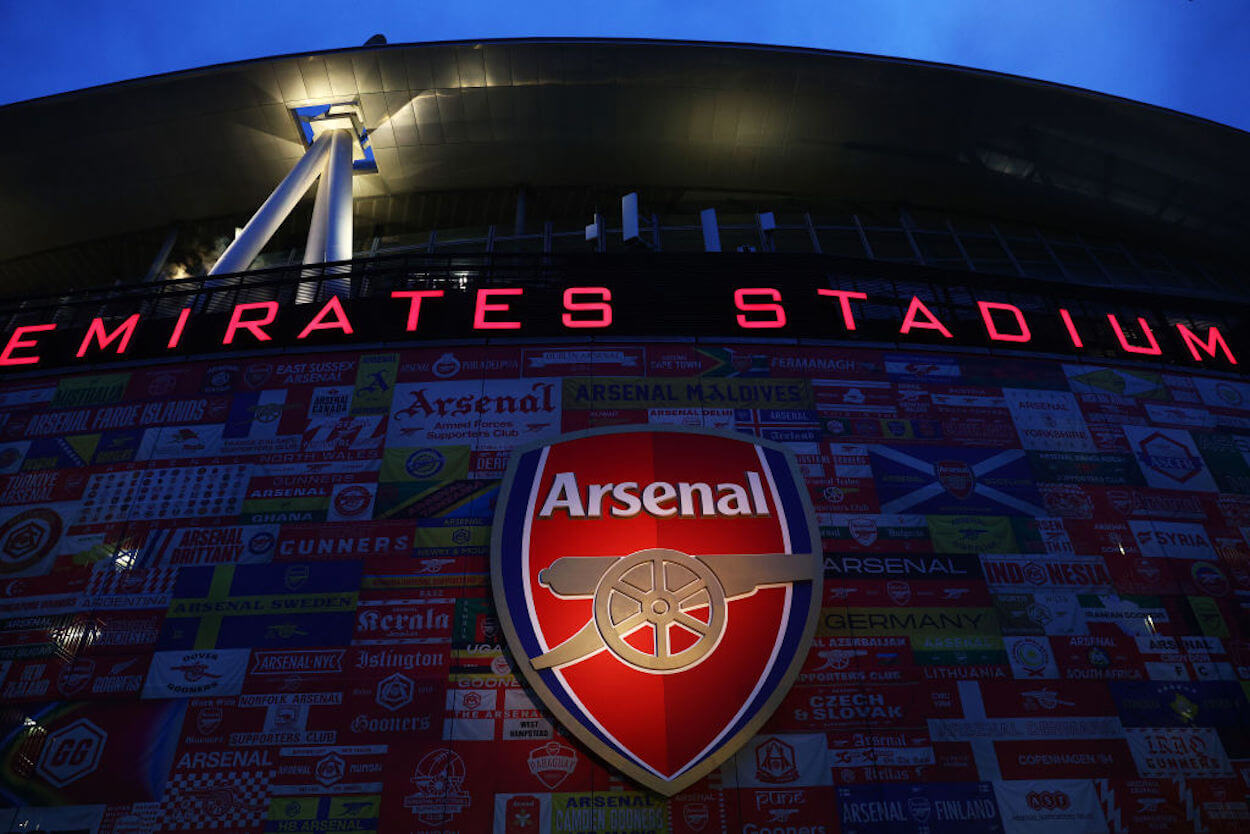 The Arsenal badge on the exterior of Emirates Stadium.