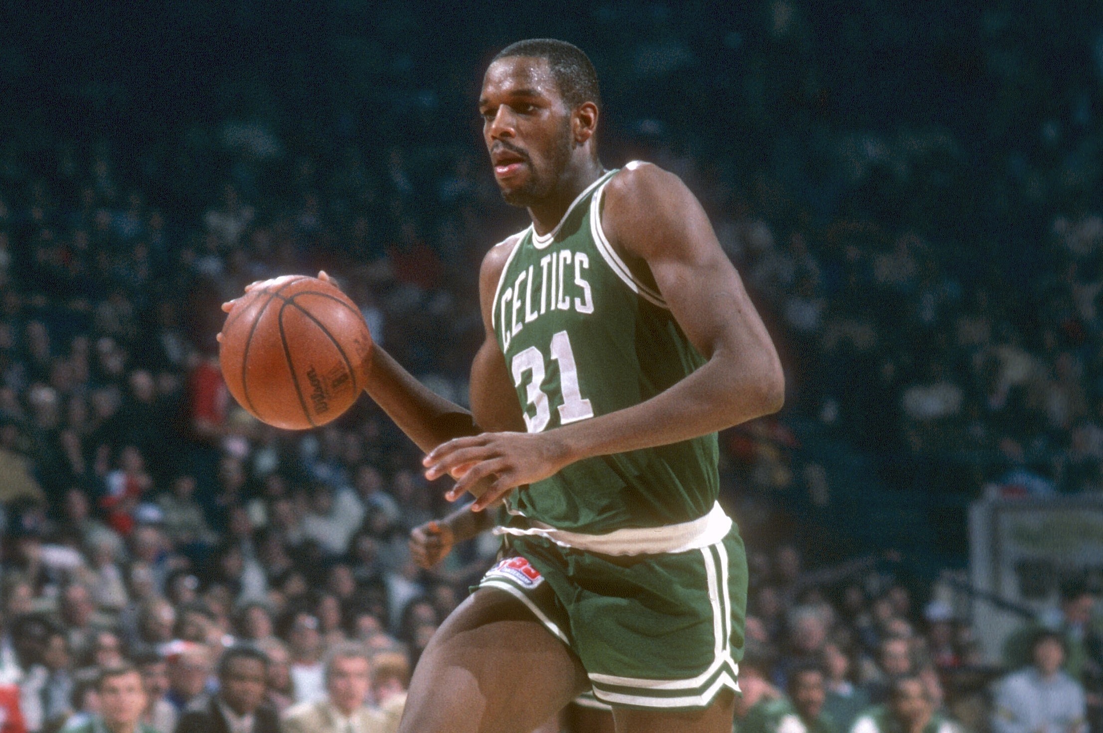 Cedric Maxwell of the Boston Celtics drives to the basket against the Washington Bullets.