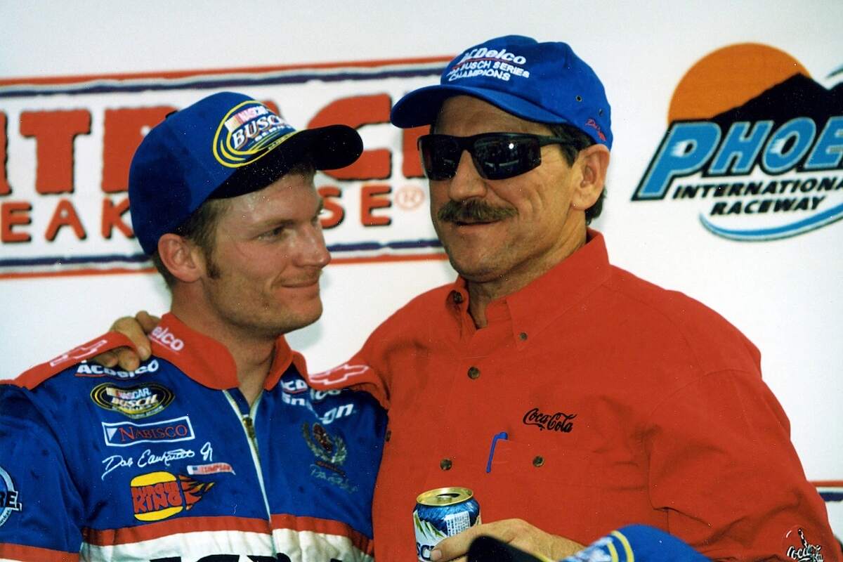 Dale Earnhardt, Jr. (L) celebrates with his dad Dale Earnhardt (R) had plenty of reason to celebrate after Jr. won the NASCAR Busch Grand National Series championship