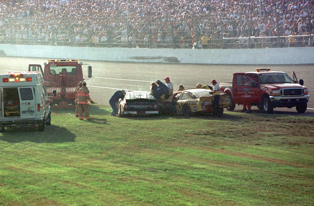 Rescue workers try to extract Dale Earnhardt from his Chevrolet moments after crash at the 2001 Daytona 500