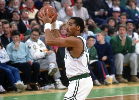 Dennis Johnson of the Boston Celtics looks to pass the ball.