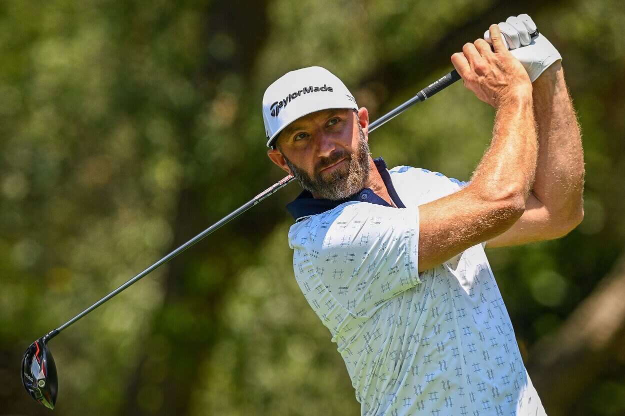 Dustin Johnson of 4Aces GC plays his tee shot on the 7th hole on during day one of LIV Golf - AndalucÌa at Real Club Valderrama on June 30, 2023 in Cadiz, Spain
