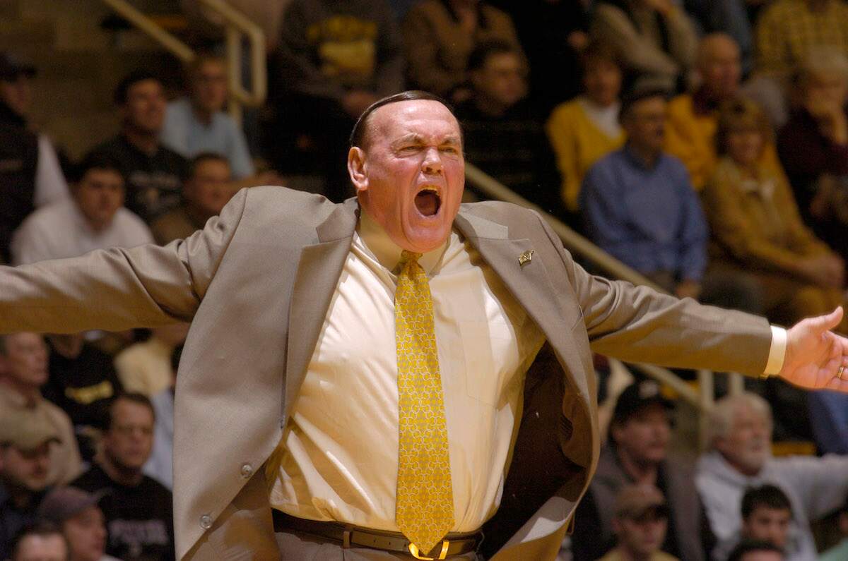 Gene Keady screams during a Purdue basketball game in 2005