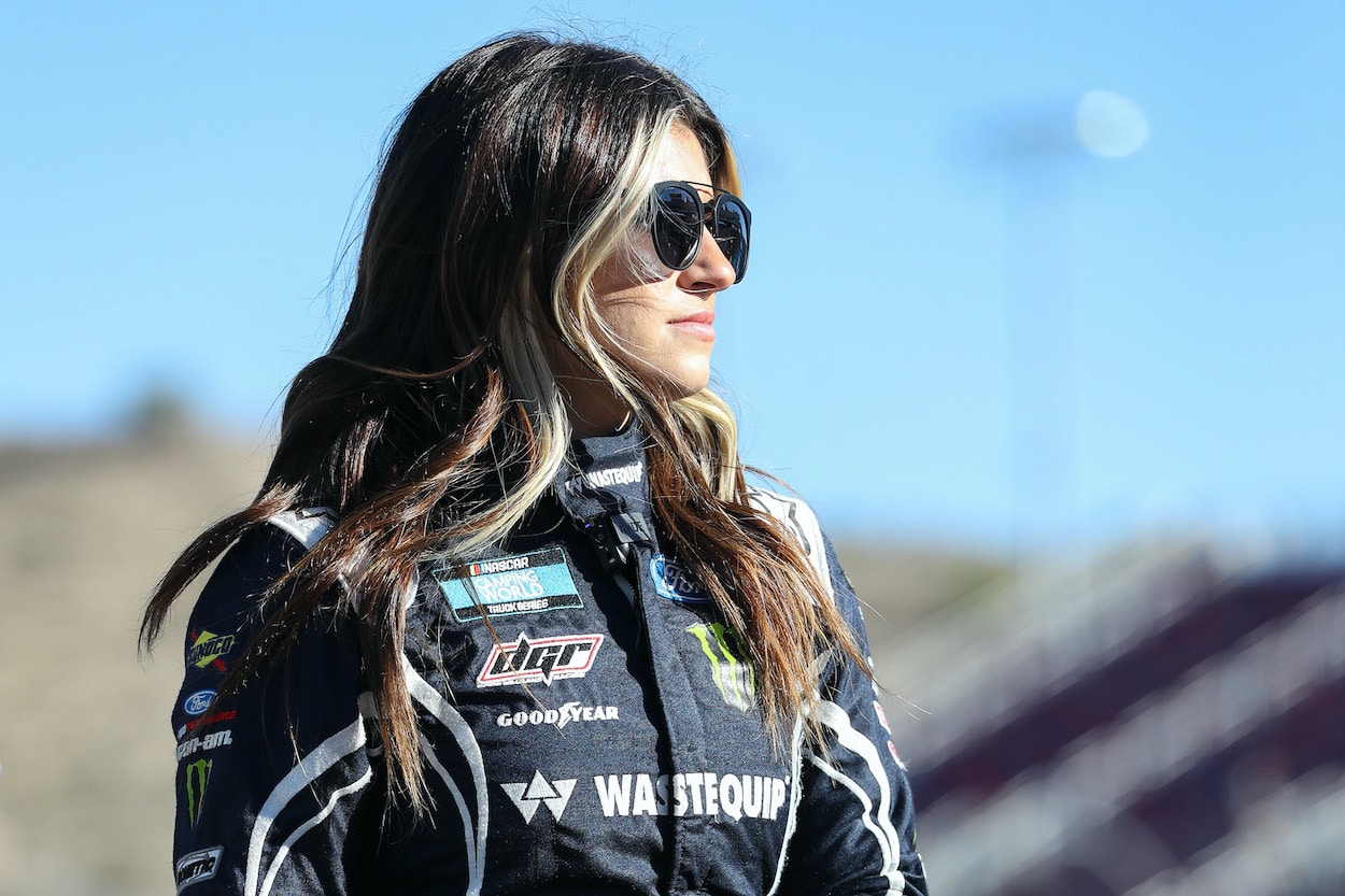 Hailie Deegan waits on grid.