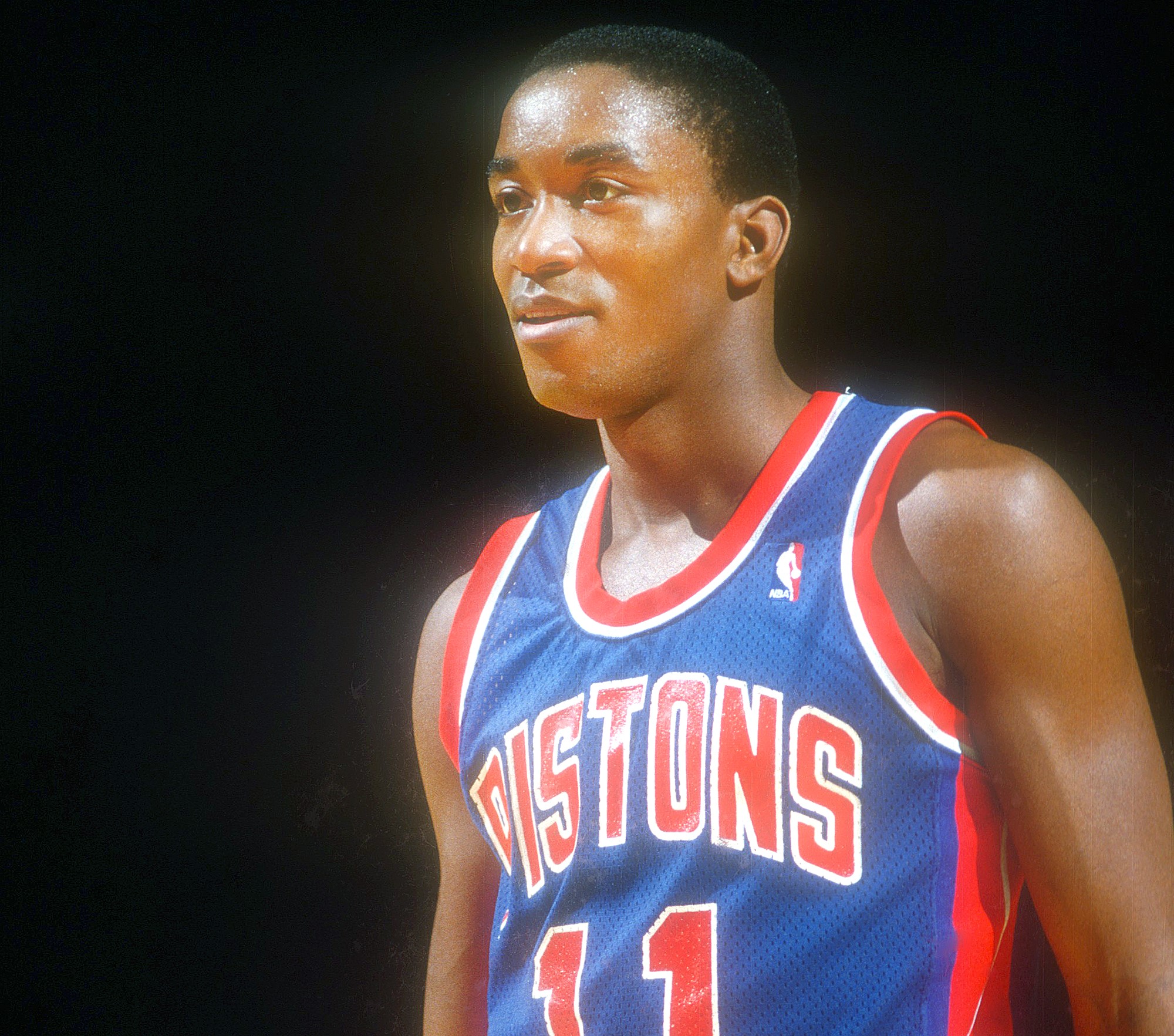 Isiah Thomas of the Detroit Pistons looks on during a NBA game against the Washington Bullets.