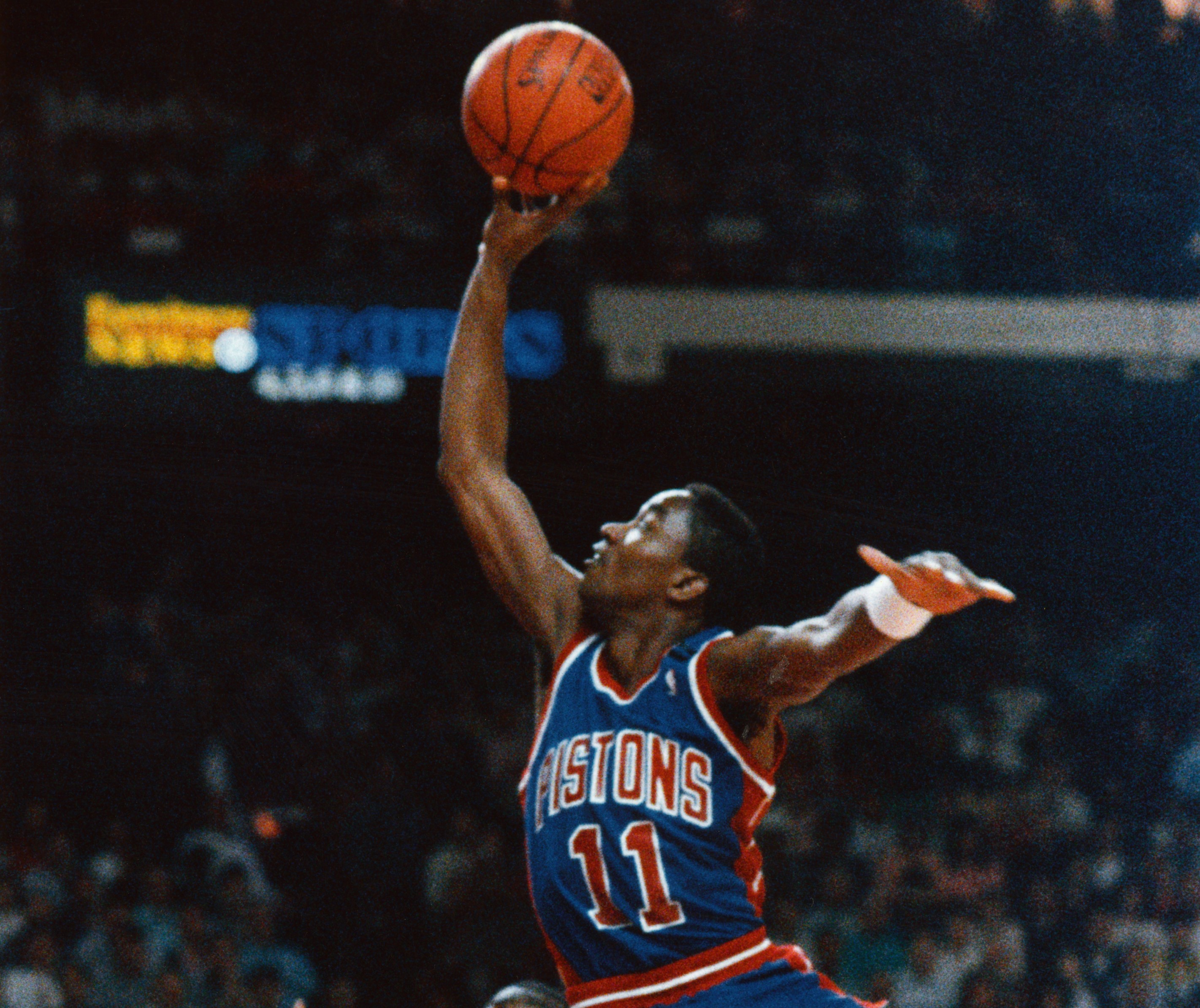 Detroit Pistons point guard Isiah Thomas flies to the basket.