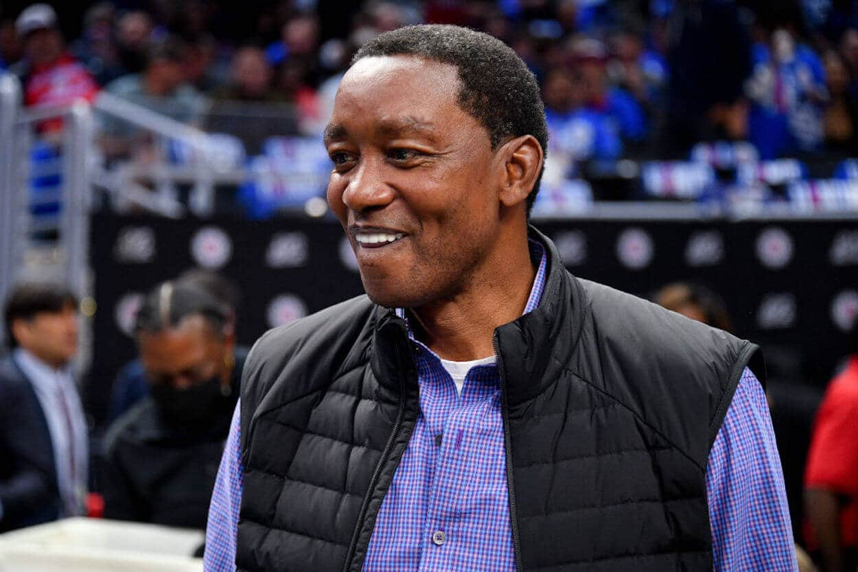 Isiah Thomas sits court-side at a 2023 NBA game.