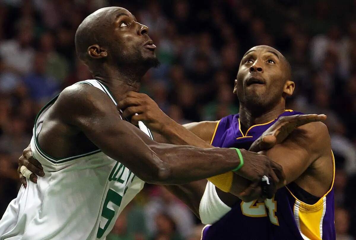 Boston Celtics forward Kevin Garnett and Los Angeles Lakers guard Kobe Bryant battle under the basket in 2009