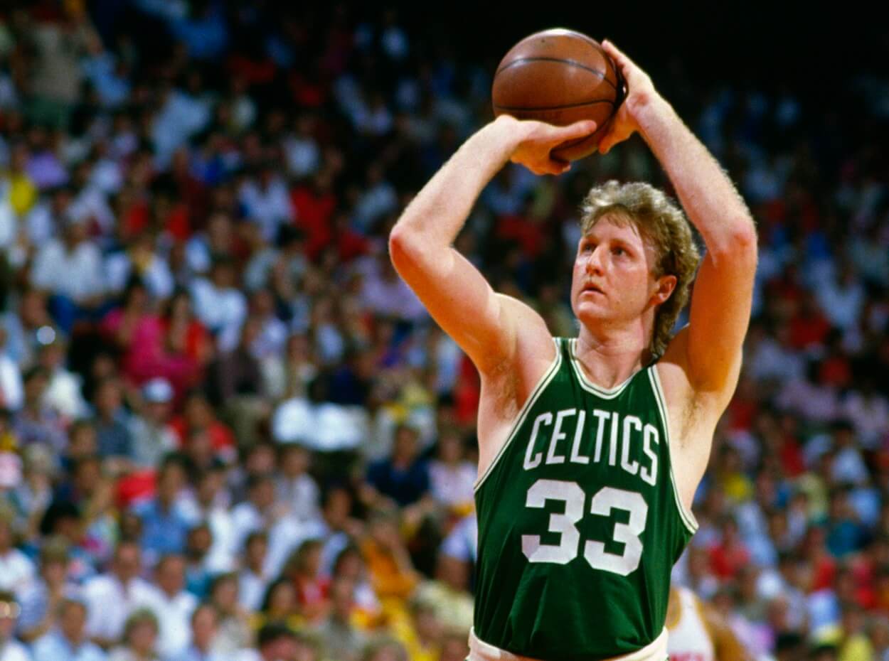 Larry Bird #33 of the Boston Celtics shoots against the Houston Rockets during an NBA Finals June 1986 at The Summit in Houston, Texas
