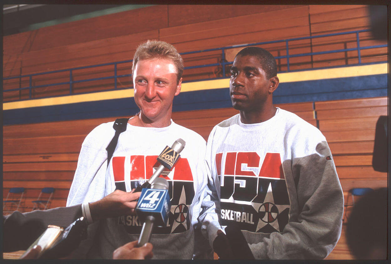 Larry Bird (L) and Magic Johnson (R) meet the media after a Dream Team practice.