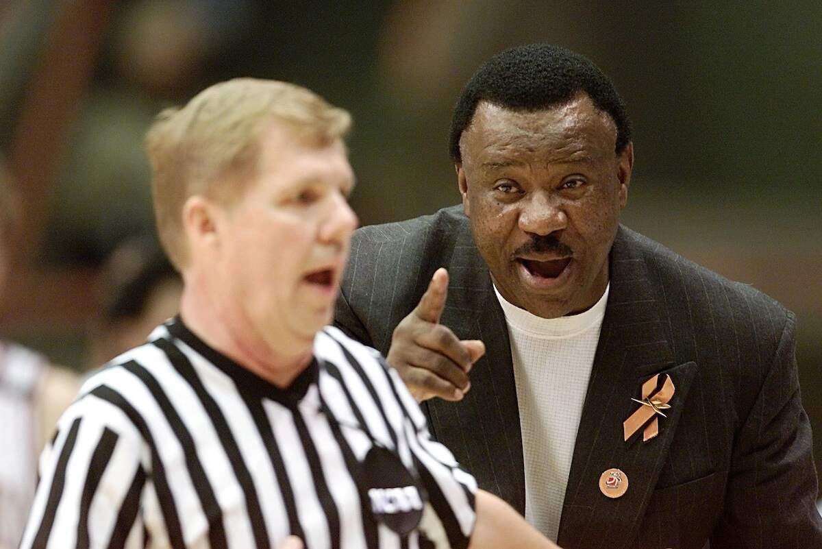 Head coach Nolan Richardson of the admonishes an official