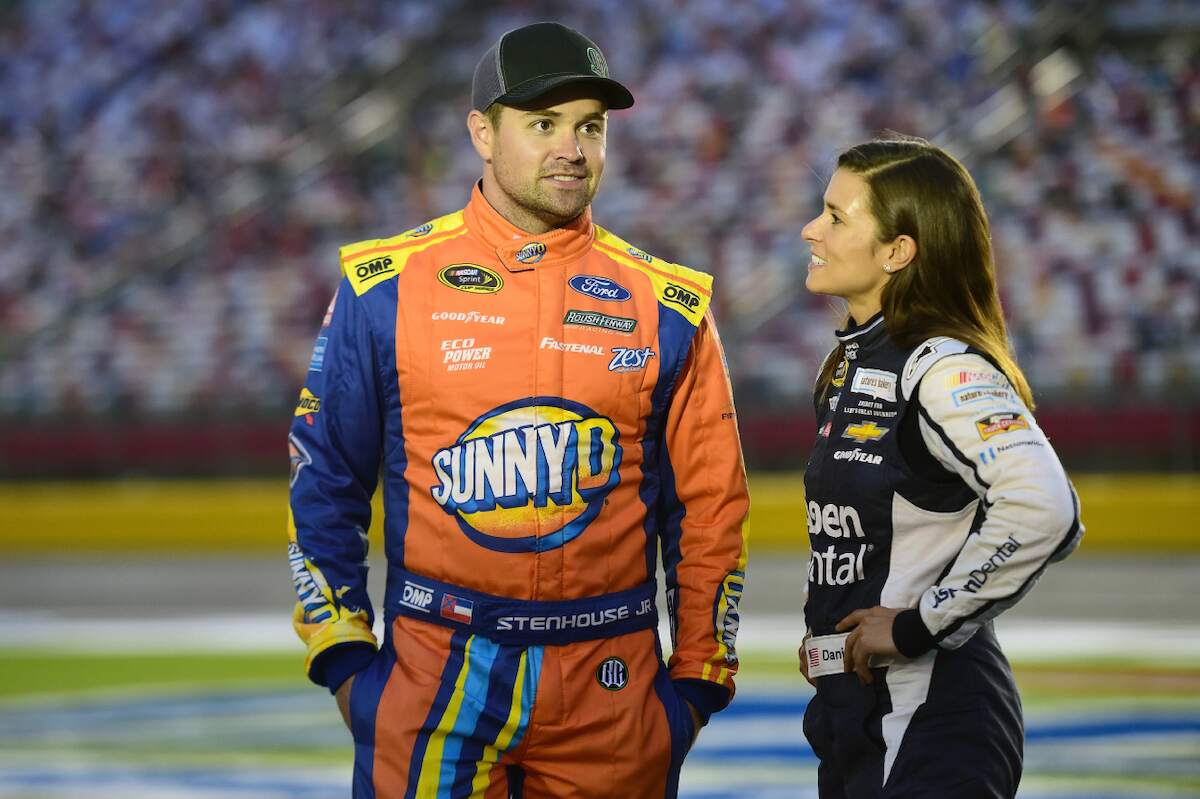 Ricky Stenhouse Jr. and Danica Patrick talk during qualifying for the NASCAR Sprint Cup Series