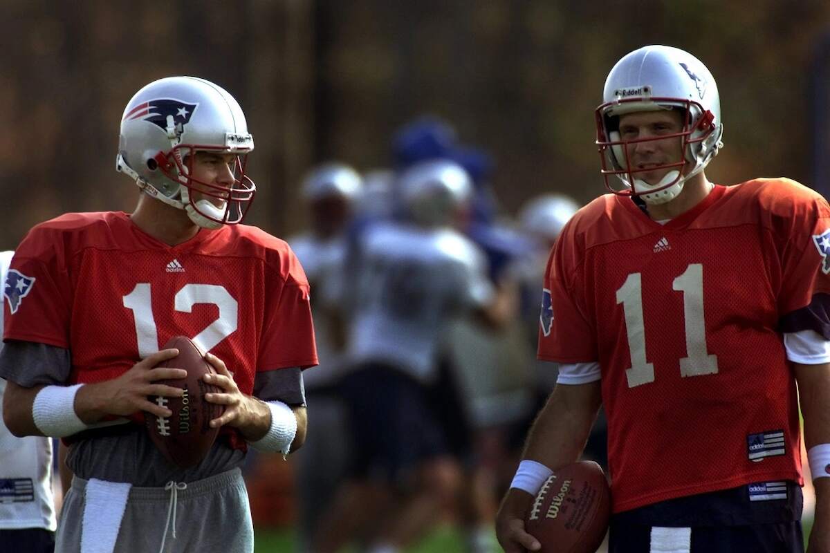 Tom Brady and Drew Bledsoe practice throwing during spring training