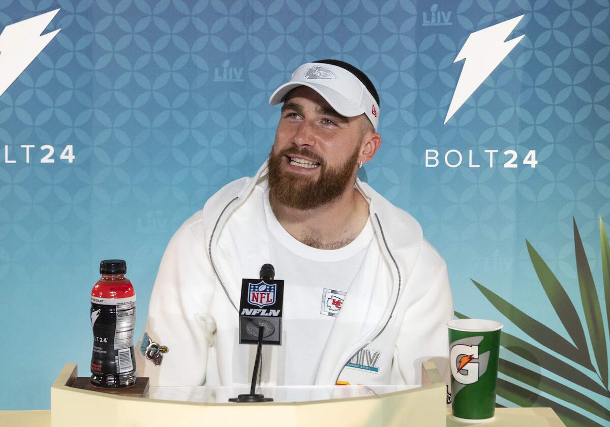 Kansas City Chiefs tight end Travis Kelce smiles as he speaks to the media