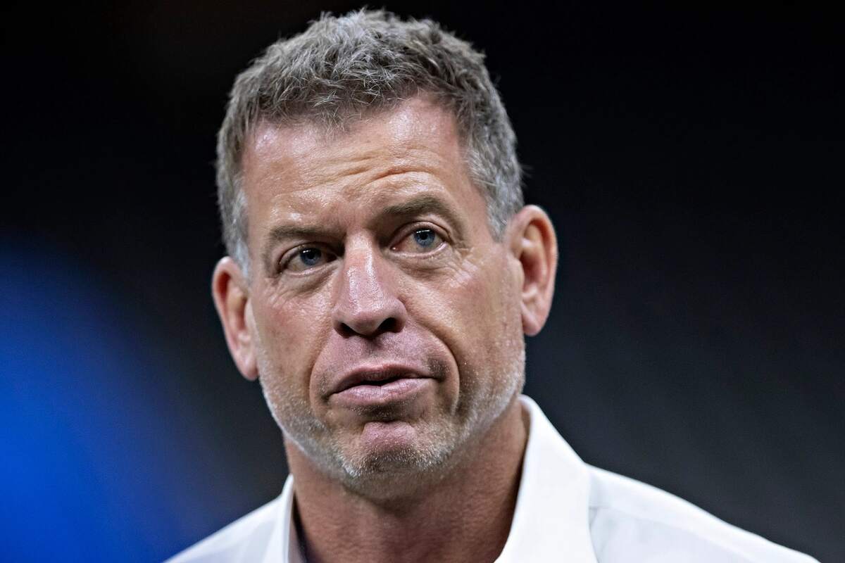 Troy Aikman walks on the field before a game between the Los Angeles Rams and the New Orleans Saints in 2018