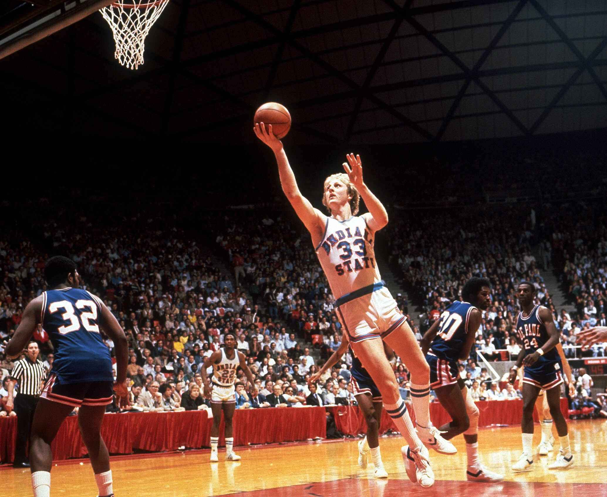 Indiana State forward Larry Bird goes to the basket against DePaul .