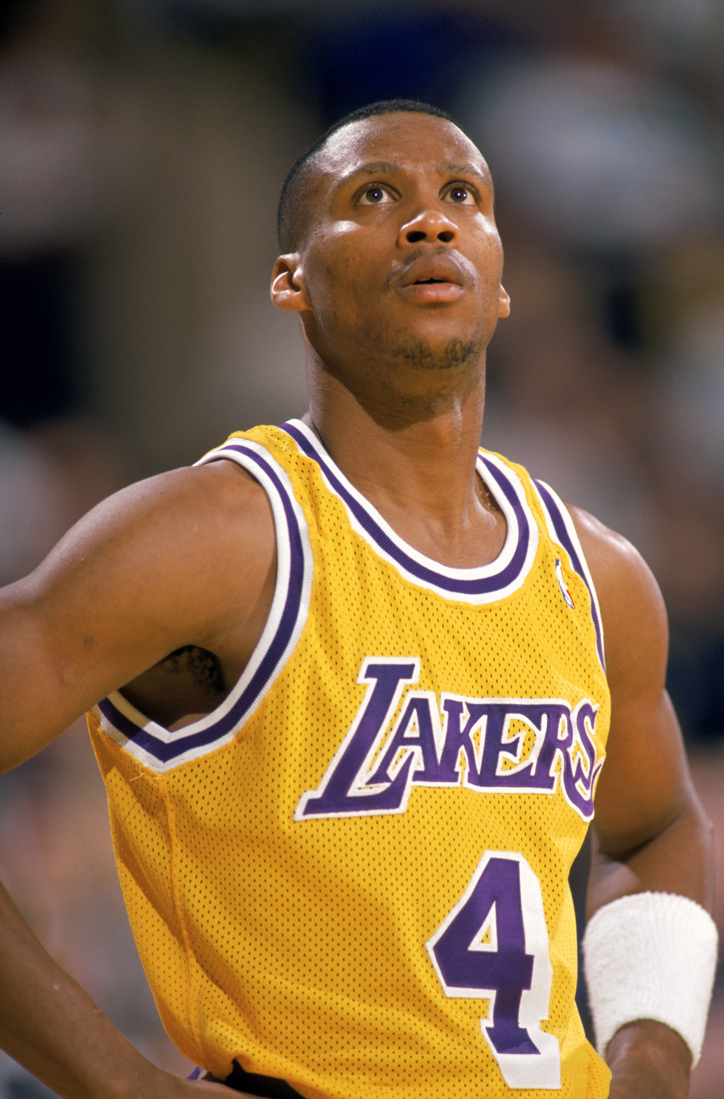 Byron Scott of the Los Angeles Lakers looks at the scoreboard.