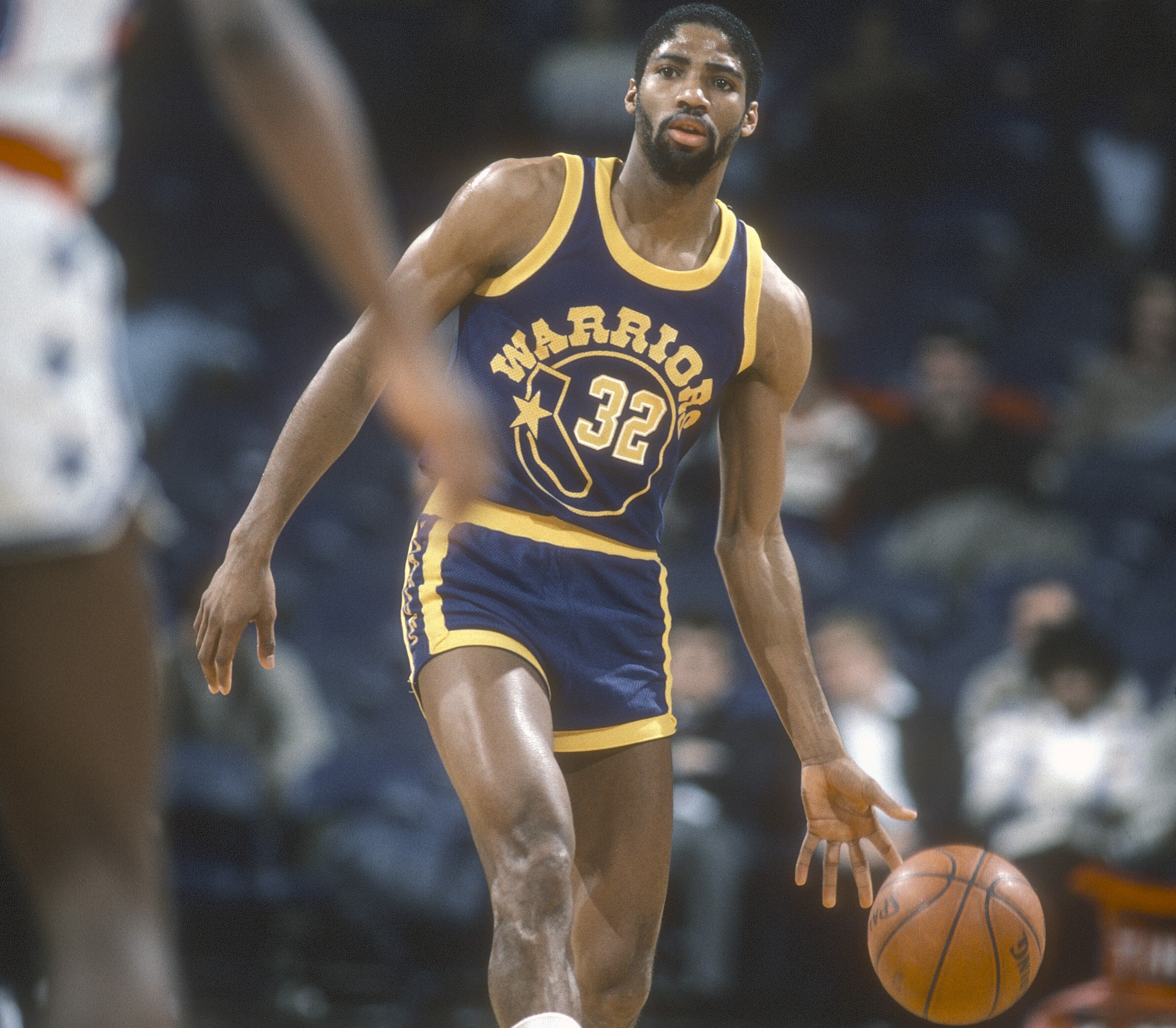 Lester Conner of the Golden State Warriors dribbles the ball against the Washington Bullets.