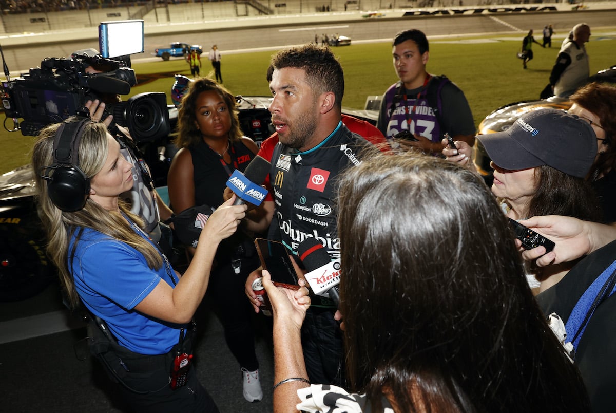 Bubba Wallace talks to media.