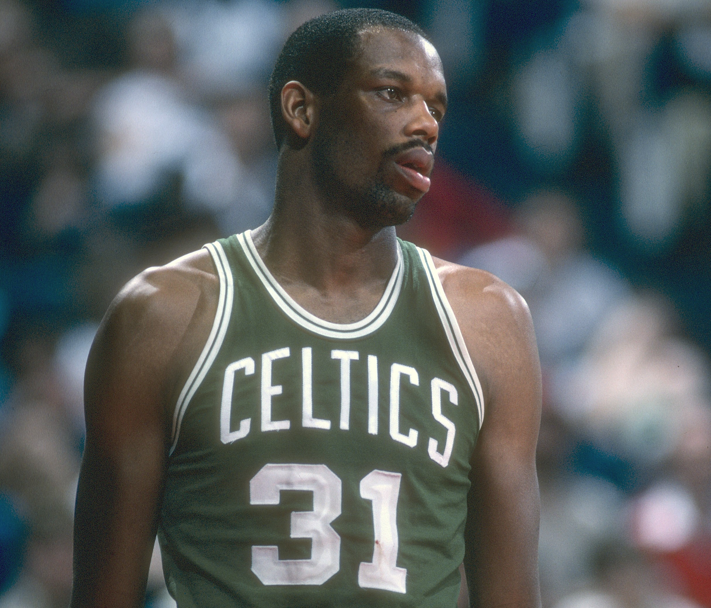 Cedric Maxwell of the Boston Celtics looks on during a break in the action against the Washington Bullets.