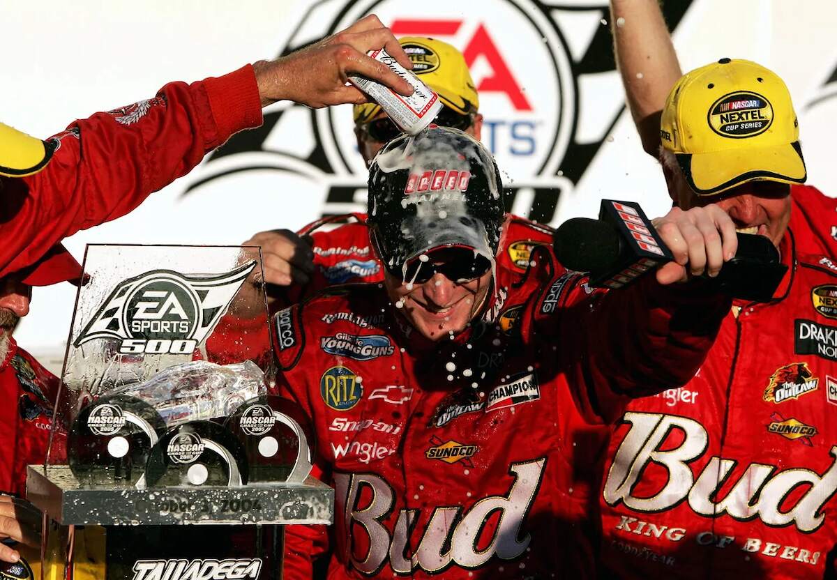 Dale Earnhardt Jr. celebrates a win in 2004