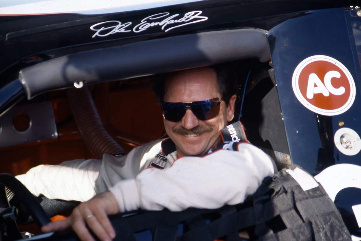 Dale Earnhardt Sr. sits in the driver's seat of his ca