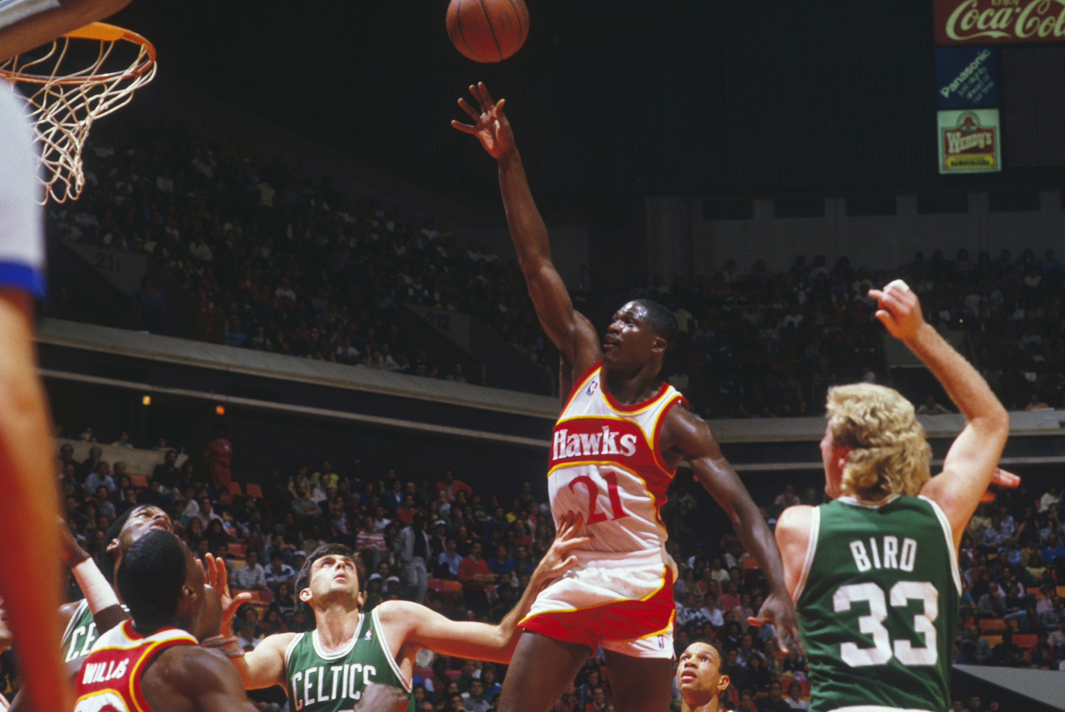 Atlanta Hawks forward Dominique Wilkins goes in for a layup against the Boston Celtics.