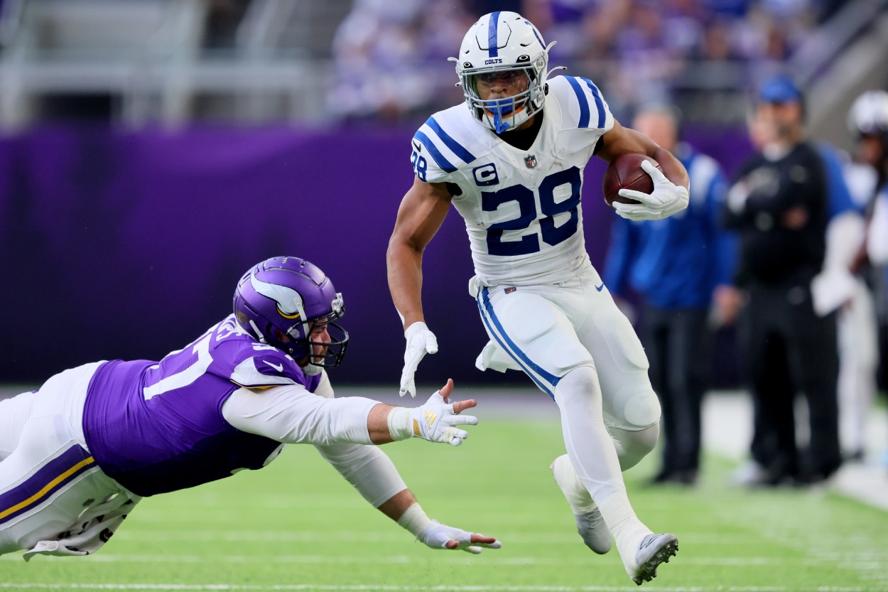 Jonathan Taylor of the Indianapolis Colts carries the ball against the Minnesota Vikings.