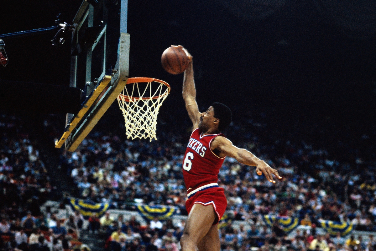 Julius Erving dunks for the Philadelphia 76ers